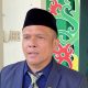 Foto Anggota Komisi II DPRD Kota Palangka Raya Khemal Nasery sedang memberikan keterangan kepada pers di depan Kantor DPRD Palangka Raya.