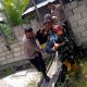 Foto tim gabungan sedang menangani ODGJ di Bukit Tunggal