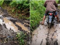 Foto kondisi jalan rusak sedang dilalui warga di Desa Soren, Kecamatan Kota Besi.